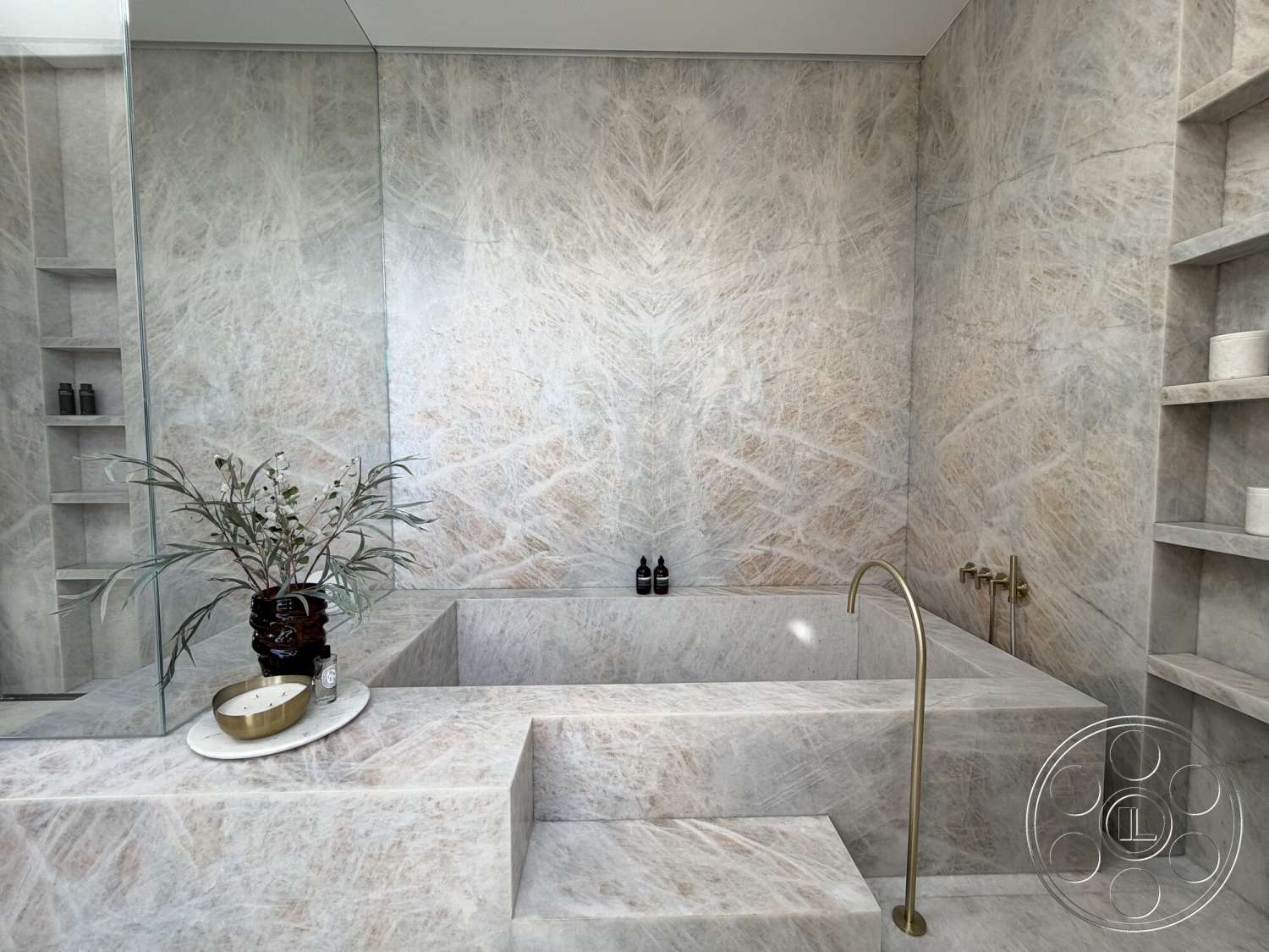 Modern 532 - neutral color palette, minimalist design, floating shelves, glass shower enclosure, gold faucet fixtures, marble bathroom walls, marble bathtub surround, textured marble wall, marble tub deck, built-in storage niches