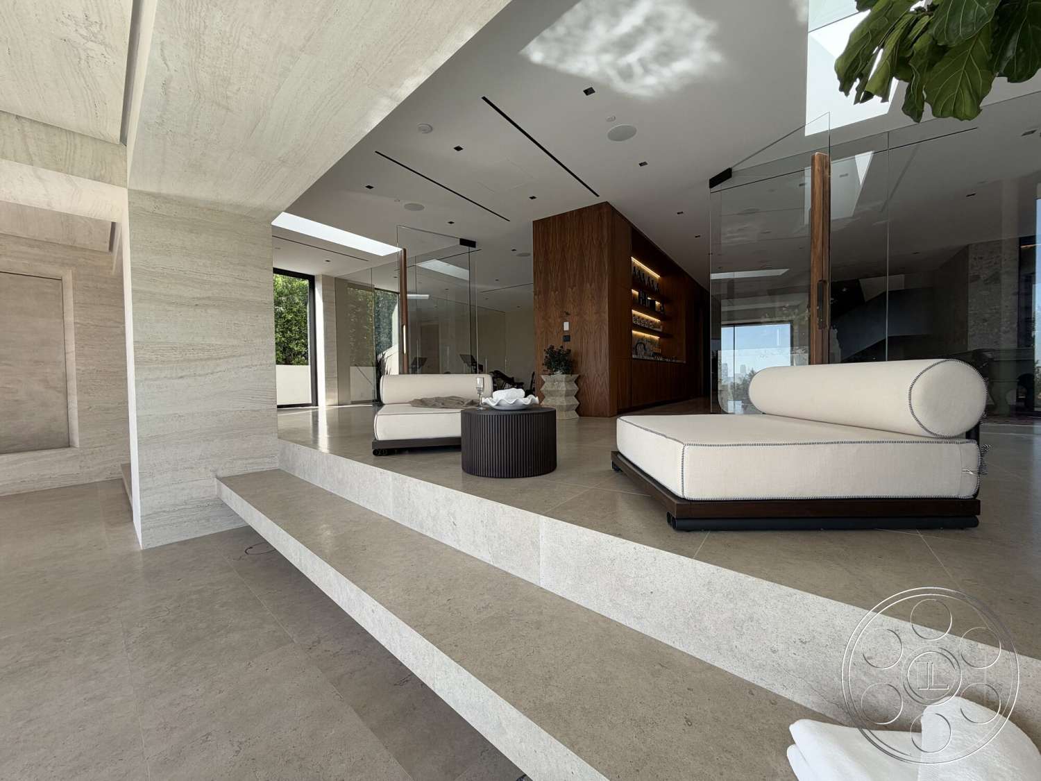 Modern 532 - neutral color palette, open floor plan, concrete walls, textured wall panel, polished stone flooring, large floor-to-ceiling windows, modern lounge area, recessed ceiling lights, contemporary architectural style, glass partition walls, minimalist furniture design, wood accent cabinetry, continuous surface steps