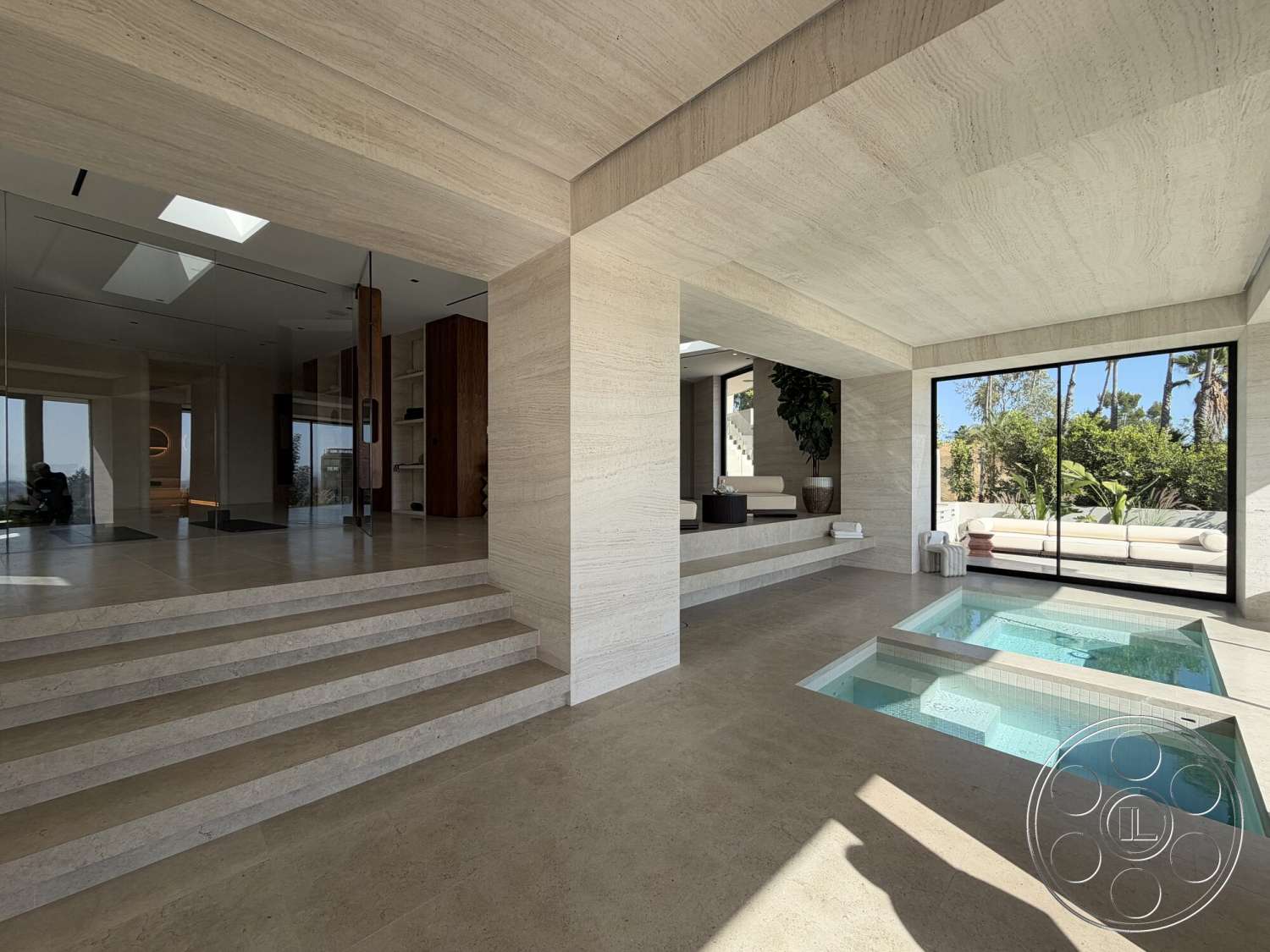 Modern 532 - minimalist design, contemporary furniture, seamless indoor-outdoor transition, open-concept living space, potted greenery, modern architectural style, curved staircase, exposed wood ceiling beams, natural light from skylights, built-in shelving units, floor-to-ceiling glass windows, stone accent walls, rectangular hot tub, tan travertine tile flooring