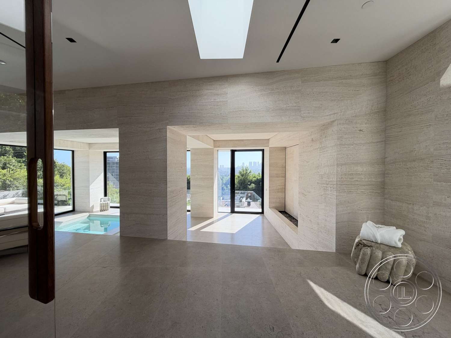 Modern 532 - contemporary design, natural lighting, open floor plan, soft lighting, glass sliding doors, floor-to-ceiling windows, skylights, travertine walls, open view, built-in fireplace, minimalist architectural style, travertine flooring, modern indoor pool