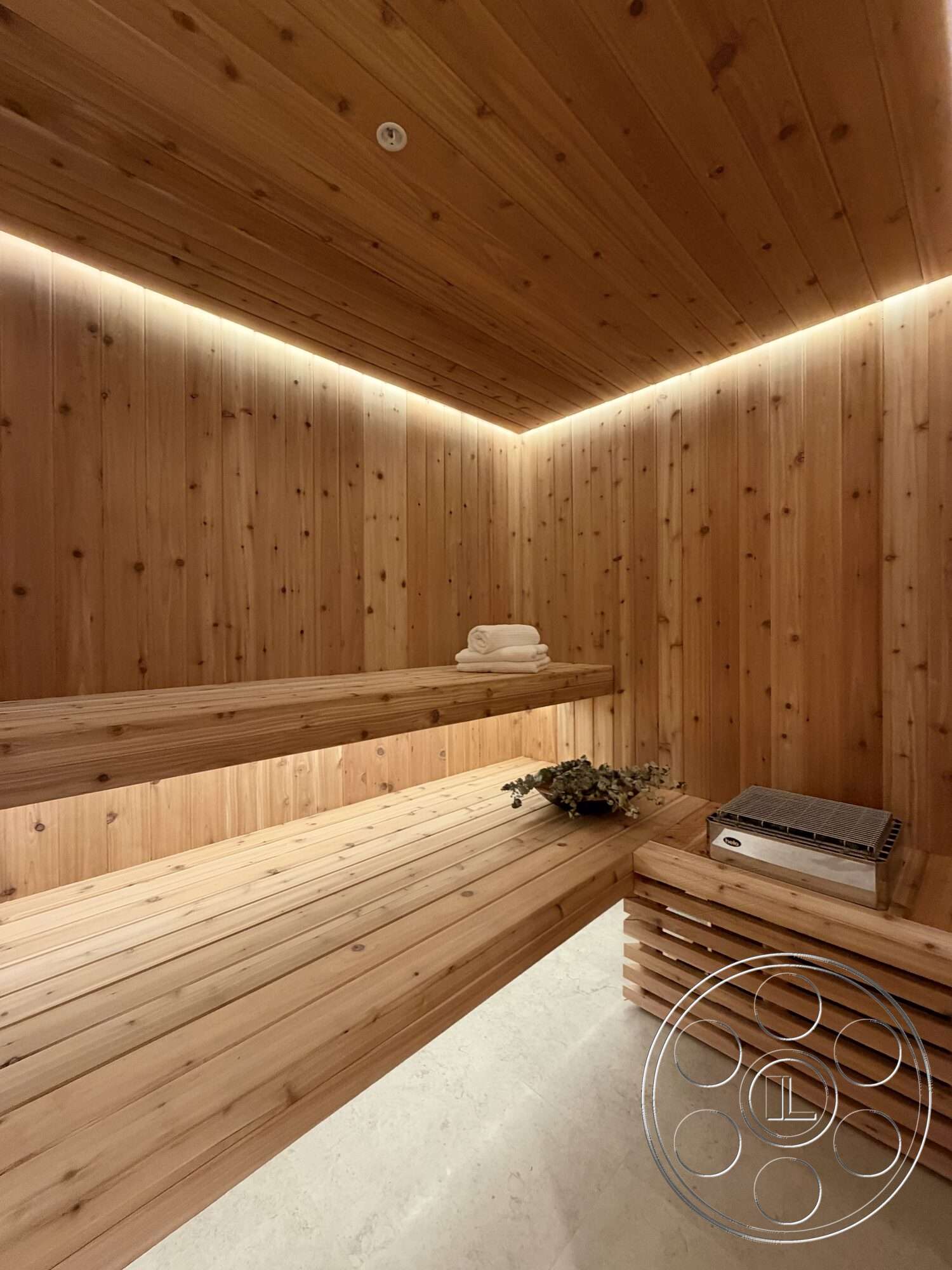 Modern 532 - minimalist design, spa room, marble flooring, cedar wood walls, recessed LED lighting, cedar wood ceiling, cedar wood benches