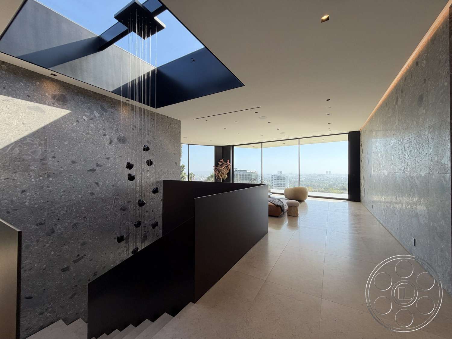 Modern 532 - neutral color palette, minimalist design elements, floor-to-ceiling windows, contemporary furnishings, polished marble flooring, black metal railing, open-concept layout, exposed stone feature wall, geometric ceiling shapes, integrated skylight