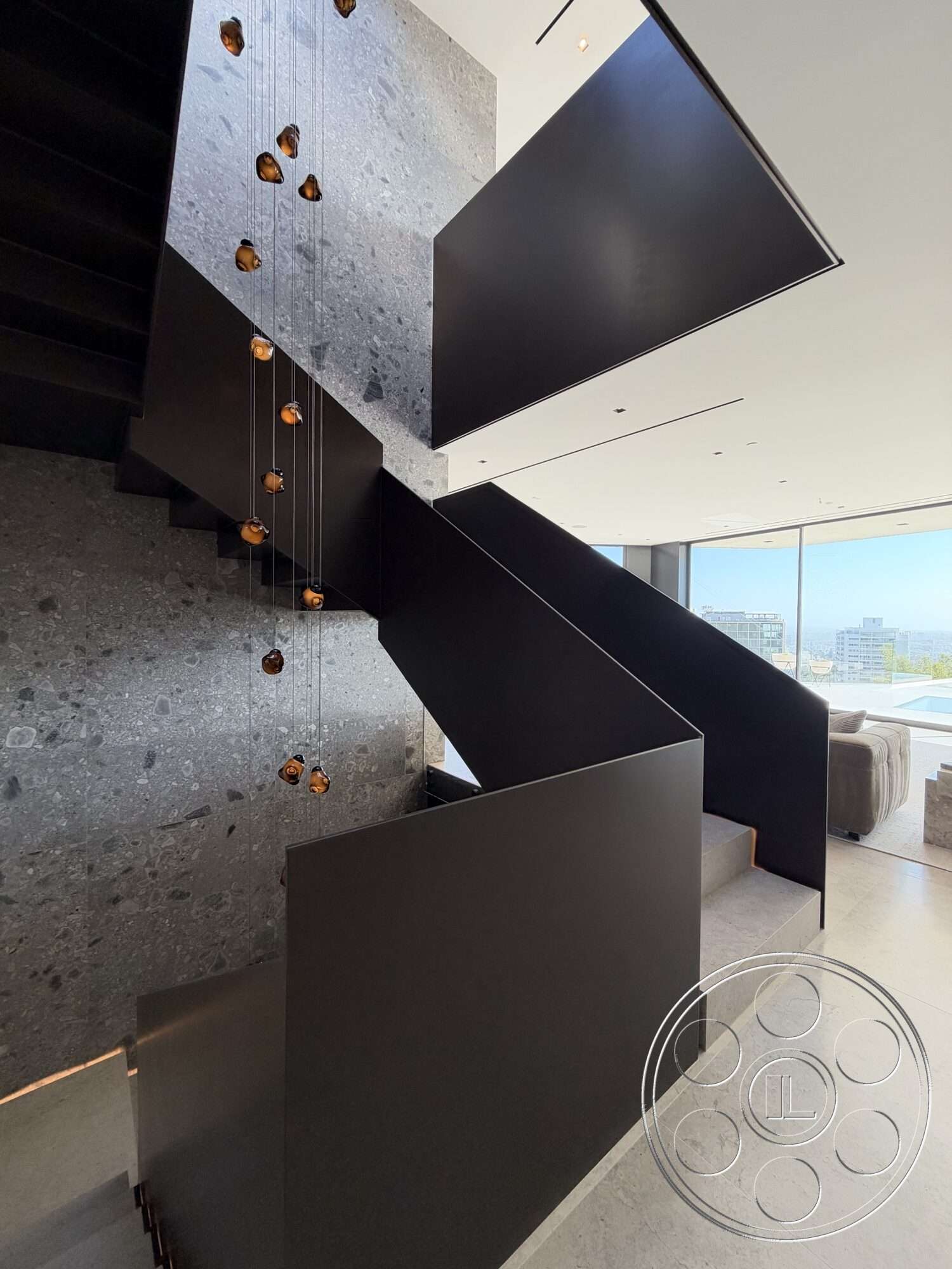 Modern 532 - minimalist design, open floor plan, large glass windows, concrete walls, modern architectural style, polished stone flooring, geometric forms, black metal staircase, pendant lighting fixtures, floating staircase design, gray granite wall treatment, industrial element details
