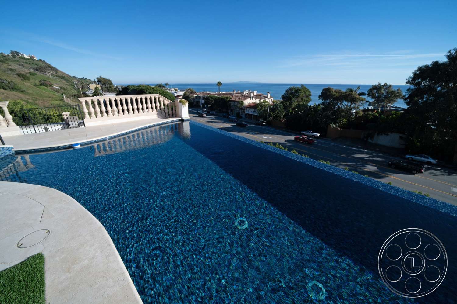 Medit 169 - landscape view, ocean view, infinity pool, sunny coastal setting, concrete pool deck, hillside location, blue mosaic tile pool interior, exterior balustrade