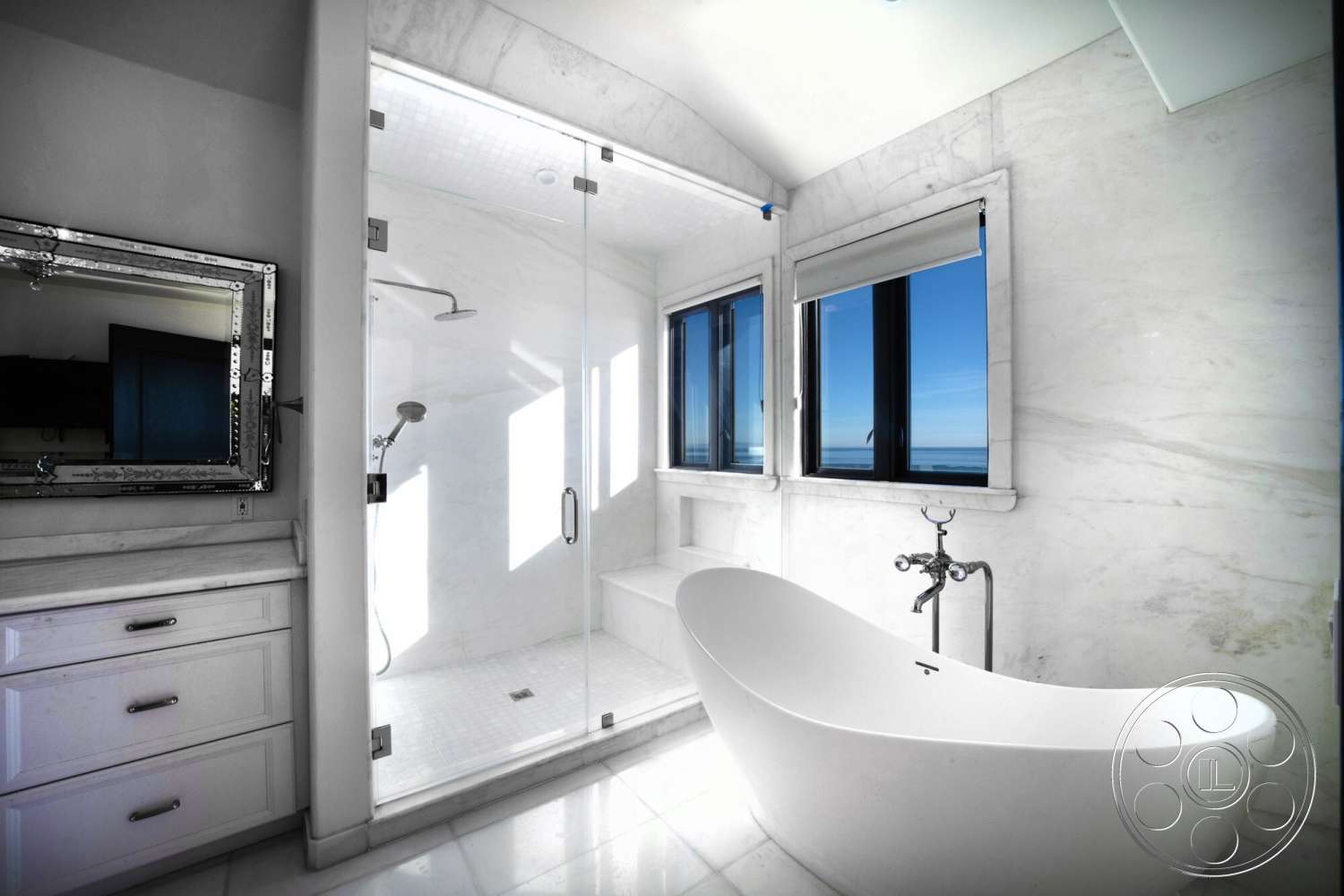Medit 169 - high ceilings, natural light, minimalist design, glass shower enclosure, luxury bathroom, freestanding soaking tub, large windows with ocean view, marble shower walls, marble bathroom flooring, modern bathroom vanity, polished chrome faucets