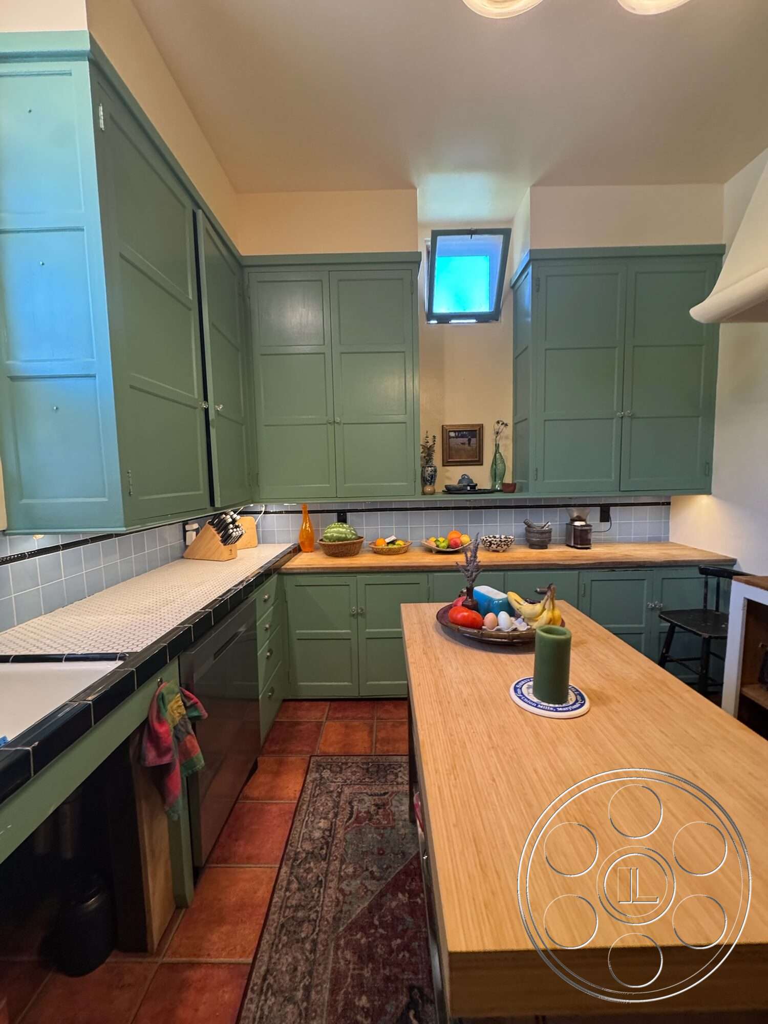 Farmstead Garden - stainless steel appliances, natural light from window, red terracotta floor tiles, open kitchen layout, interior kitchen, tile kitchen backsplash, farmhouse-style kitchen, green painted cabinetry, bamboo countertop