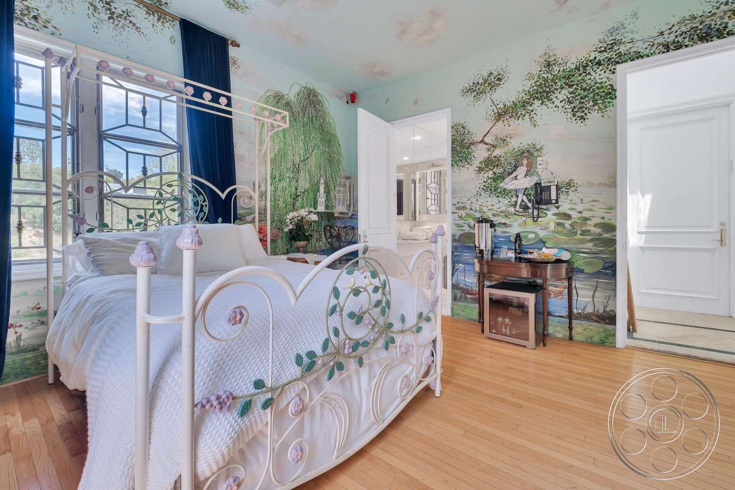 French 29 - floor-to-ceiling windows, soothing color palette, decorative accent pieces, modern side table, artistic ceiling design, hardwood bedroom floors, metal canopy bed, floral mural wall treatment, blue velvet drapes
