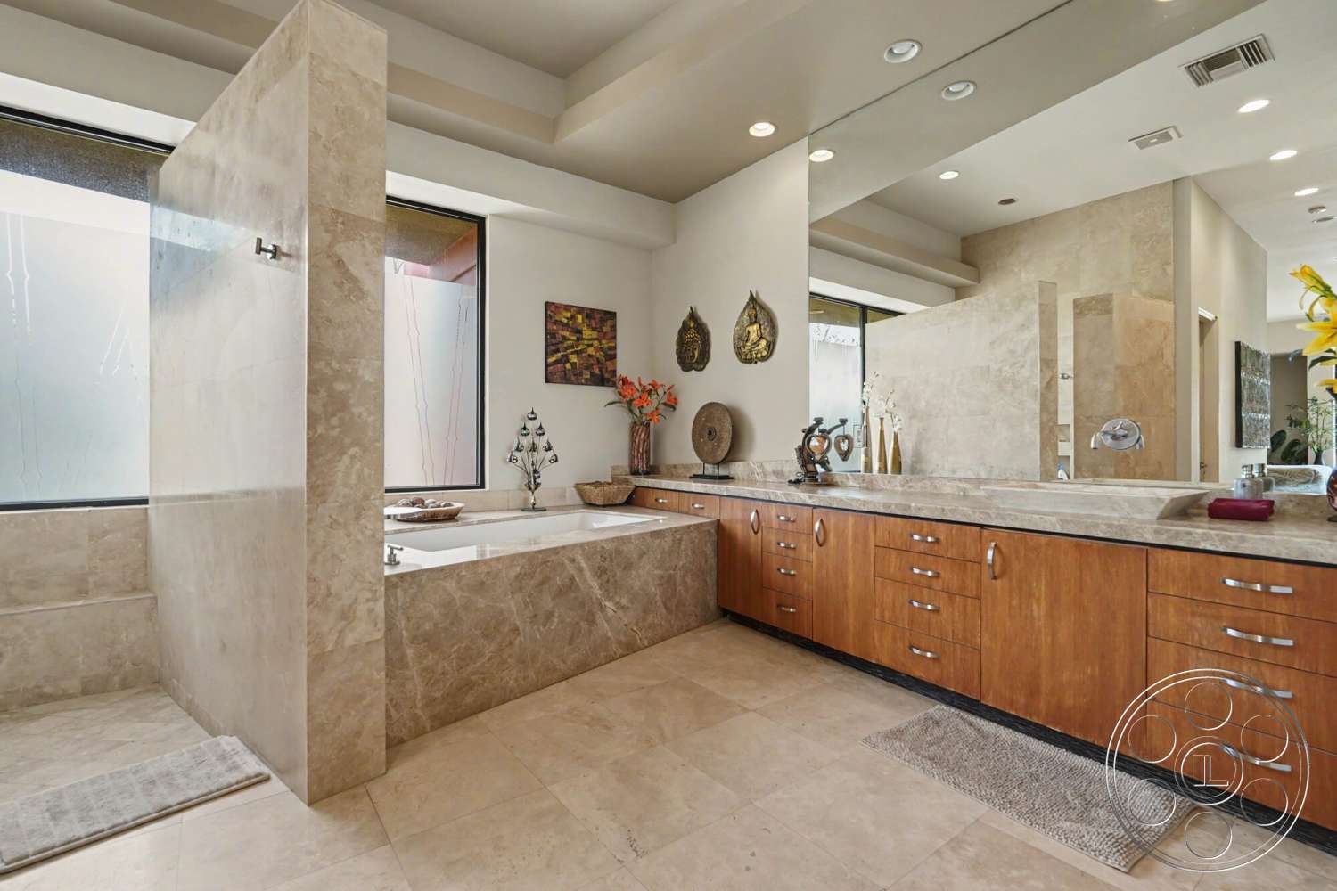 Rancho Mirage 4 - minimalistic decor, textured plaster walls, stone tile flooring, contemporary bathroom design, interior bathroom, glass shower partition, modern recessed lighting, marble bathtub surround, wood vanity cabinets, large frosted windows