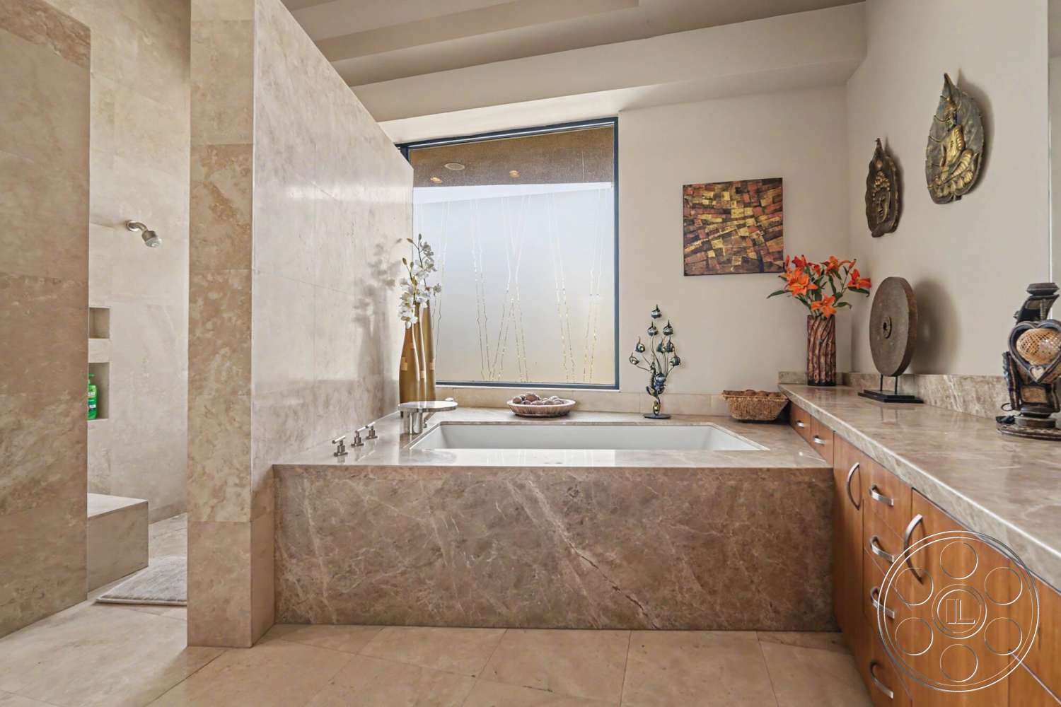 Rancho Mirage 4 - wood cabinetry, textured wall panels, decorative wall art, stone backsplash, modern faucet fixtures, tile bathroom flooring, marble bathtub surround, exposed shower niche, large window with glass treatment, shower area with glass enclosure