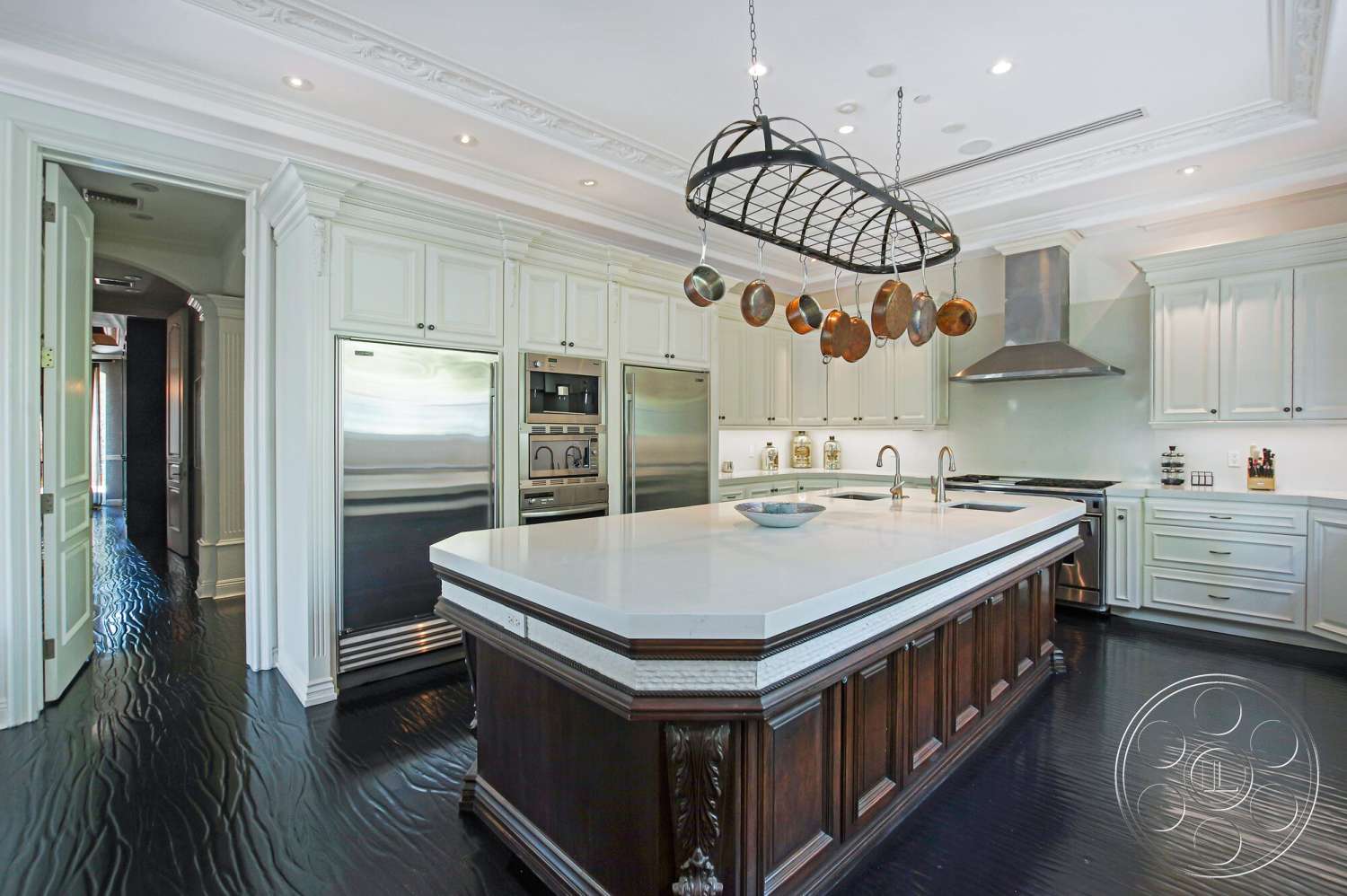 Medit 170 - stainless steel appliances, open concept layout, white cabinetry, decorative crown molding, modern kitchen design, dark hardwood kitchen floors, marble kitchen island countertop, hanging pot rack, contemporary range hood