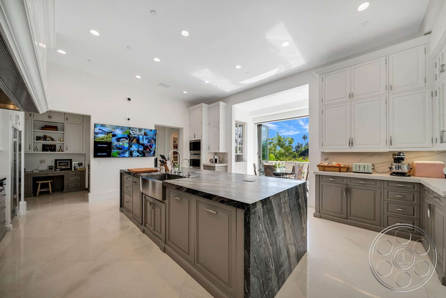Medit 171 - neutral color palette, contemporary style, recessed lighting, open floor plan, stainless steel appliances, floor-to-ceiling windows, butler's pantry, light gray cabinetry, light-filled space, modern kitchen design, built-in kitchen cabinets, white quartz countertops, marble kitchen island, tile kitchen floors