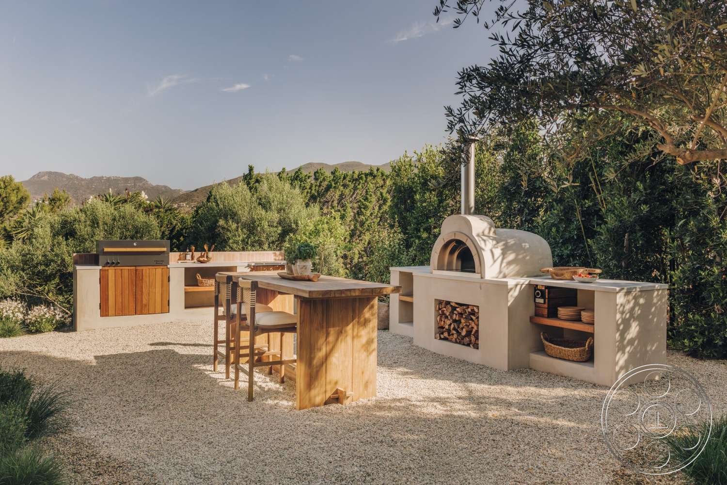 Modern 533 - natural stone accents, wooden bar stools, wood cabinetry, wood dining table, mountain view setting, gravel patio flooring, lush garden landscaping, exterior outdoor kitchen, concrete outdoor countertops, brick pizza oven