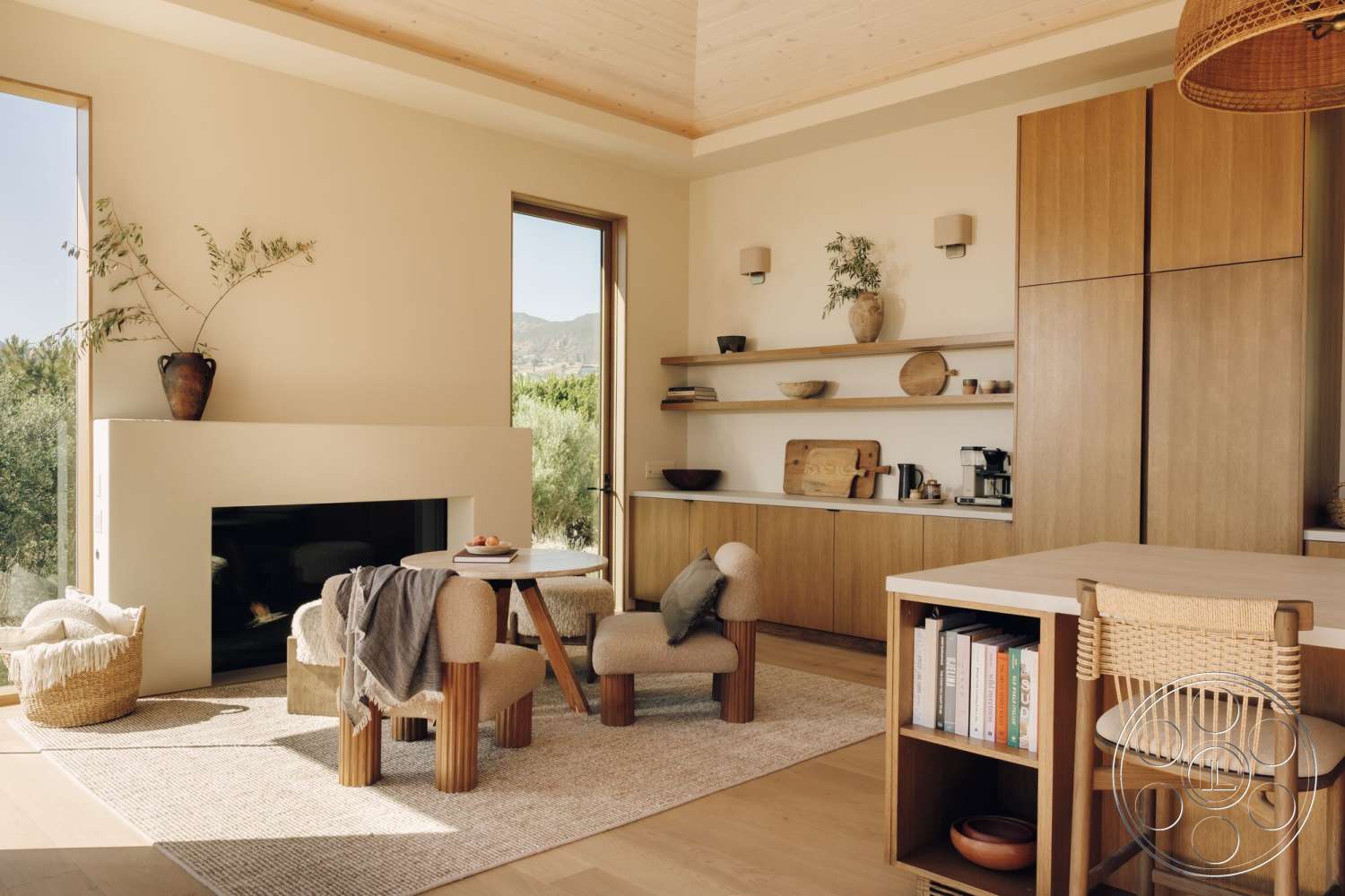 Modern 533 - neutral color palette, round coffee table, textured wall finish, light wood cabinetry, large floor-to-ceiling windows, comfortable seating area, woven dining chair, minimalist decor elements, soft area rug flooring, indoor plant accents, open shelving units, wood ceiling planks, concrete fireplace surround, natural light bay window