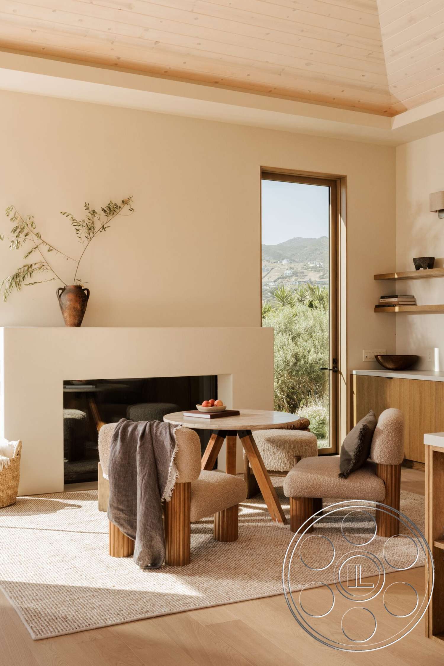 Modern 533 - minimalist decor, light hardwood flooring, open floor plan, floor-to-ceiling windows, textured plaster walls, beige area rug, round wooden dining table, light wood ceiling beams, modern fireplace design, upholstered accent chairs, earthy plant decor