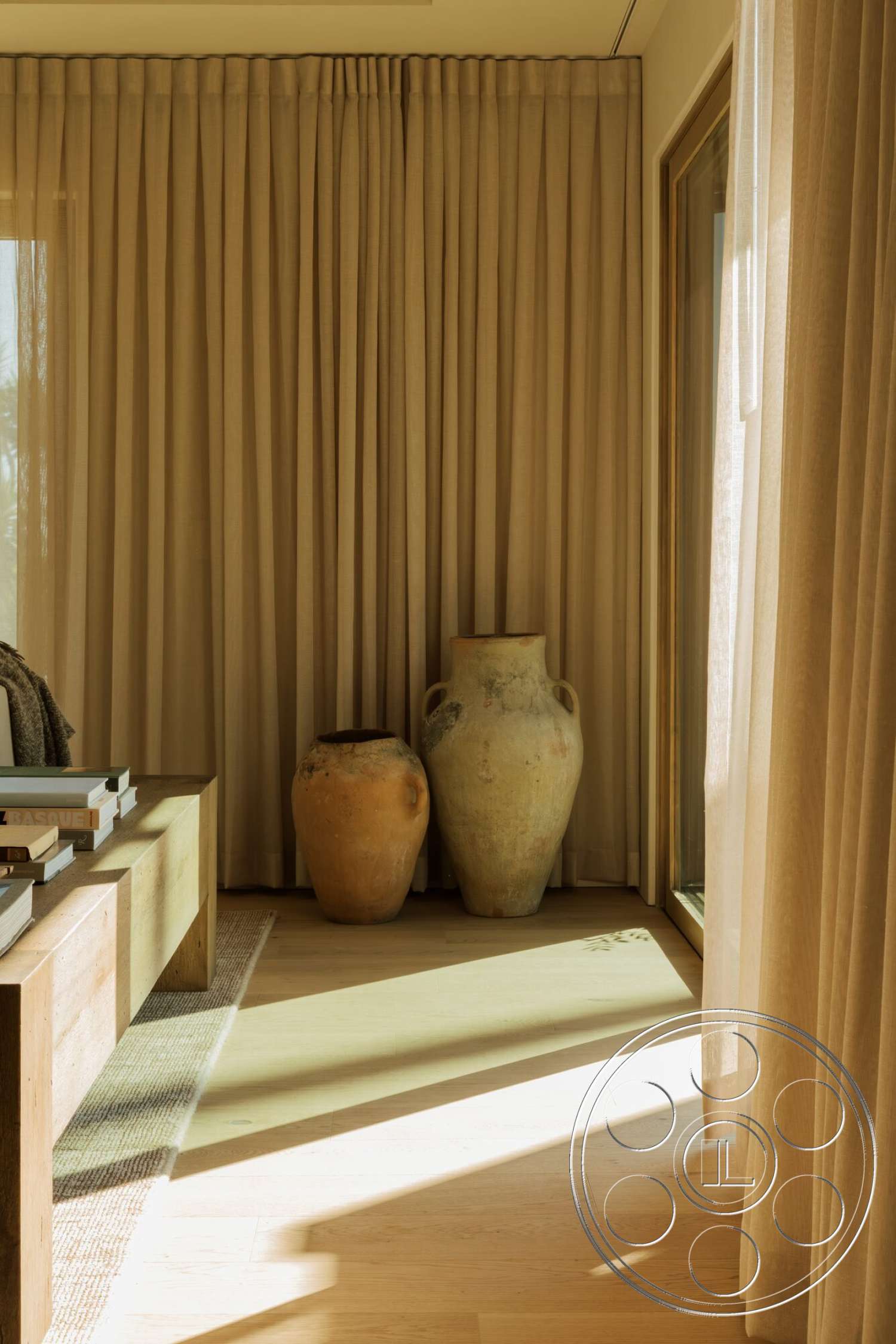 Modern 533 - light wood flooring, floor-to-ceiling windows, modern interior design, natural light interior, contemporary decorative elements, minimalist wooden coffee table, exposed clay pottery, soft beige drapery curtains