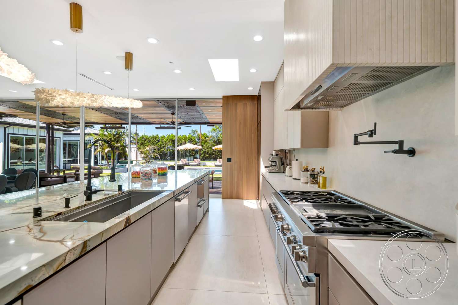 Modern 534 - contemporary design, wood cabinetry, open concept design, floor-to-ceiling windows, modern kitchen island, stainless steel kitchen appliances, interior kitchen space, marble kitchen countertop, flat ceiling with recessed lighting, tile kitchen flooring, light wood panel wall, unit with integrated sink, exterior view of landscaped garden
