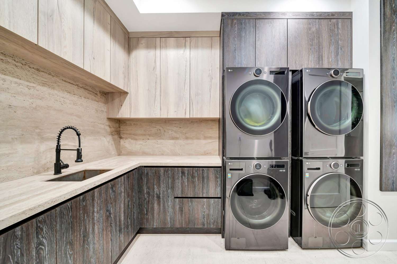 Modern 534 - minimalist design, wood cabinetry, open shelving, stone countertop, stacked washer and dryer, textured wood paneling, porcelain floor tiles, black kitchen faucet, modern laundry room