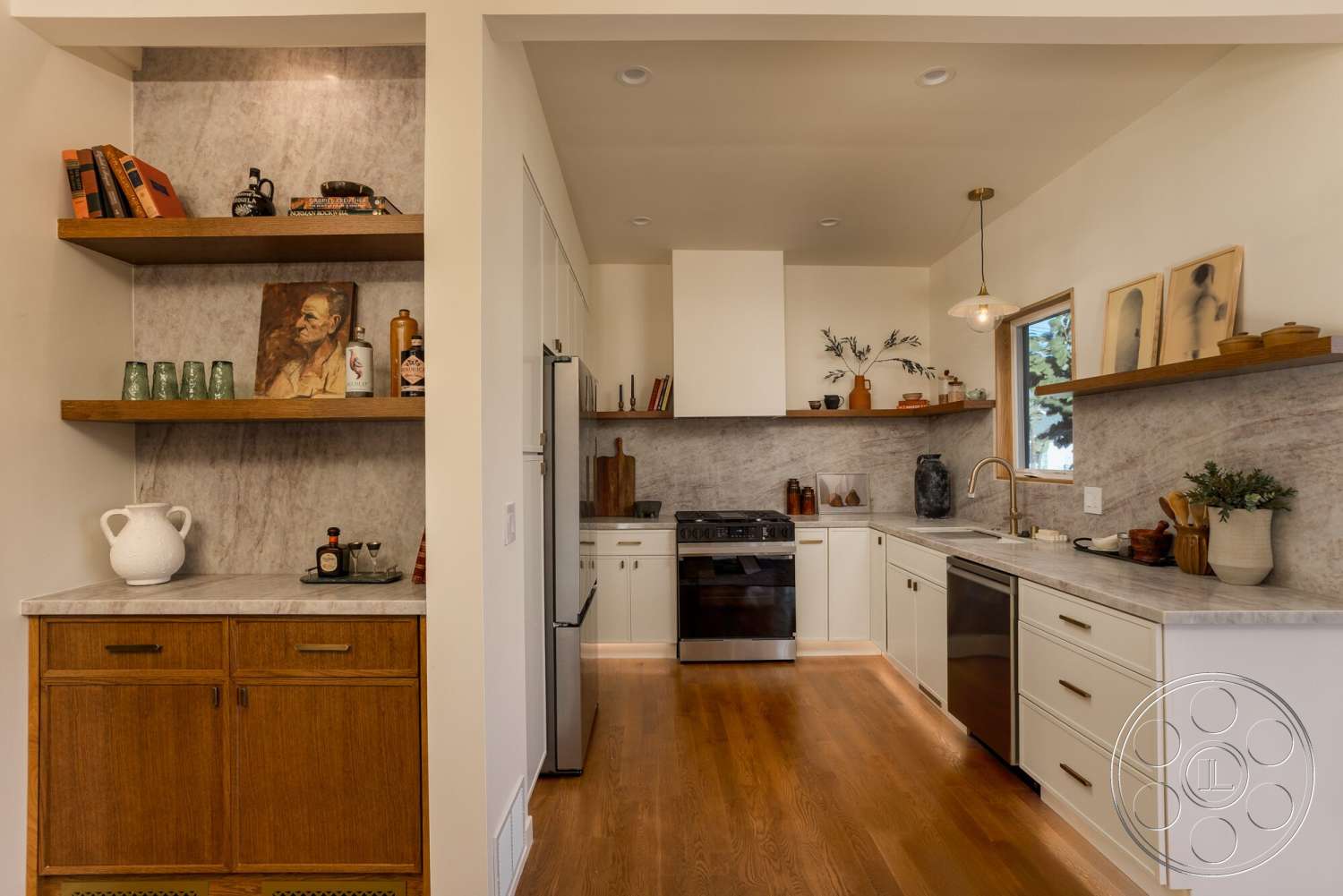 Craftsman 65 - recessed lighting, stainless steel appliances, marble backsplash, open kitchen layout, hardwood kitchen floors, white cabinet doors, wood floating shelves, earthy decor accents, brushed gold faucet, black gas stove
