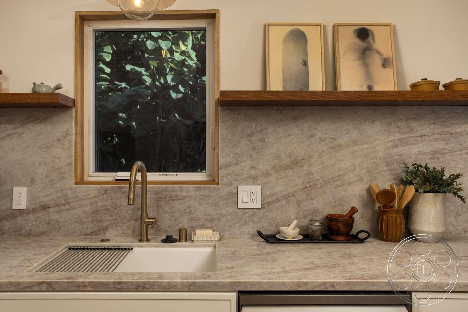 Craftsman 65 - framed artwork, marble countertop, potted greenery, textured wall treatment, decorative kitchen accessories, undermount sink, brass faucet, modern kitchen layout, clean lines design, white kitchen cabinetry, wood floating shelves, window with wood trim