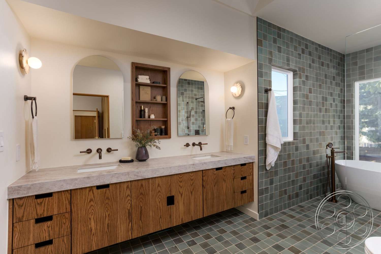 Craftsman 65 - freestanding bathtub, glass shower enclosure, wooden door, concrete countertop, natural light from windows, hexagonal tile flooring, interior bathroom, white painted walls, minimalist lighting fixtures, textured tile bathroom walls, bronze faucet fixtures, wood cabinetry vanity, green square mosaic tiles, modern round mirrors, recessed wall shelves, brushed bronze towel ring