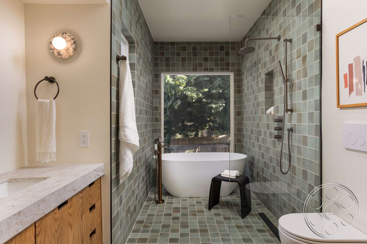 Craftsman 65 - neutral color palette, minimalist design, glass shower enclosure, textured plaster walls, open window view, floating wooden vanity, freestanding soaking tub, marble bathroom countertop, green ceramic tile shower walls, modern wall-mounted shower fixture, round wall sconce lighting