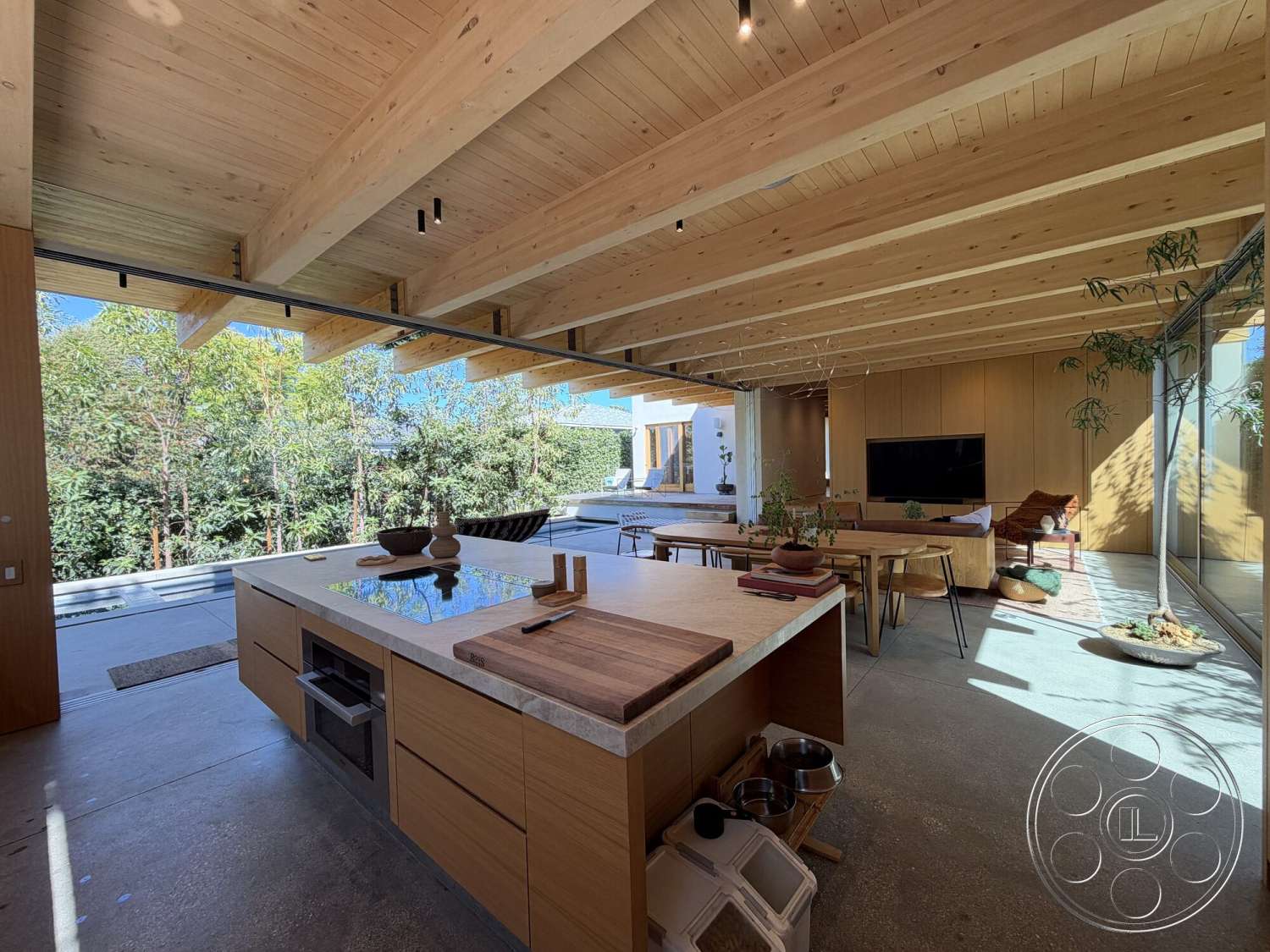 Retro House - natural light, minimalist design, indoor plants, open floor plan, concrete flooring, wood dining table, floor-to-ceiling windows, marble countertop, modern kitchen island, glass wall, relaxed living space, modern dining chairs, contemporary architectural style, wood beam ceiling, built-in kitchen cabinets, green wall garden, outdoor connectivity