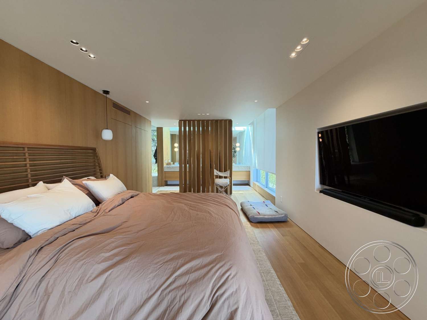 Retro House - neutral color palette, contemporary style, recessed lighting, minimalist design, open layout, wall-mounted television, glass partition, window with natural light, textured wall treatment, decorative throw pillows, light wood paneling, queen-size bed, decorative room divider, hardwood bedroom floors, floating bed frame