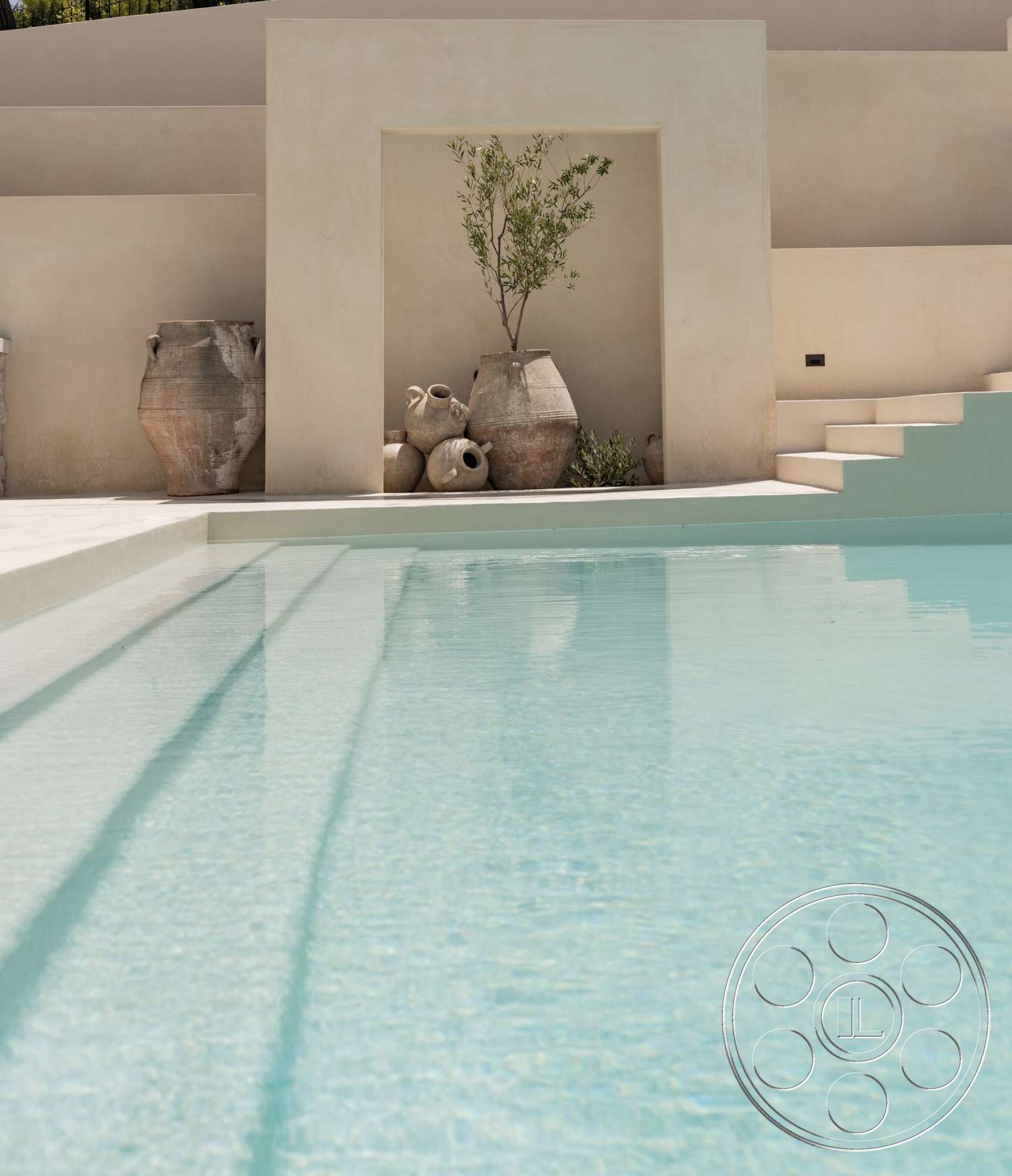 Modern 535 - exterior, minimalist design, landscaped area, stucco walls, ceramic pots, infinity pool, concrete pool deck, textured plaster wall, outdoor step stairs