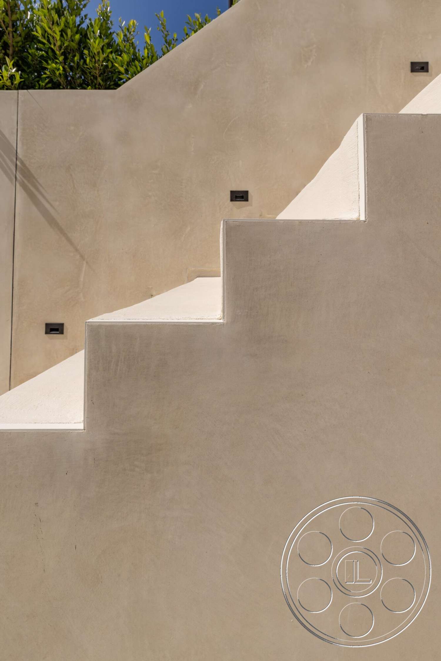 Modern 535 - smooth concrete wall, exposed concrete steps, landscaped outdoor setting, rectangular stair shape, interior design element