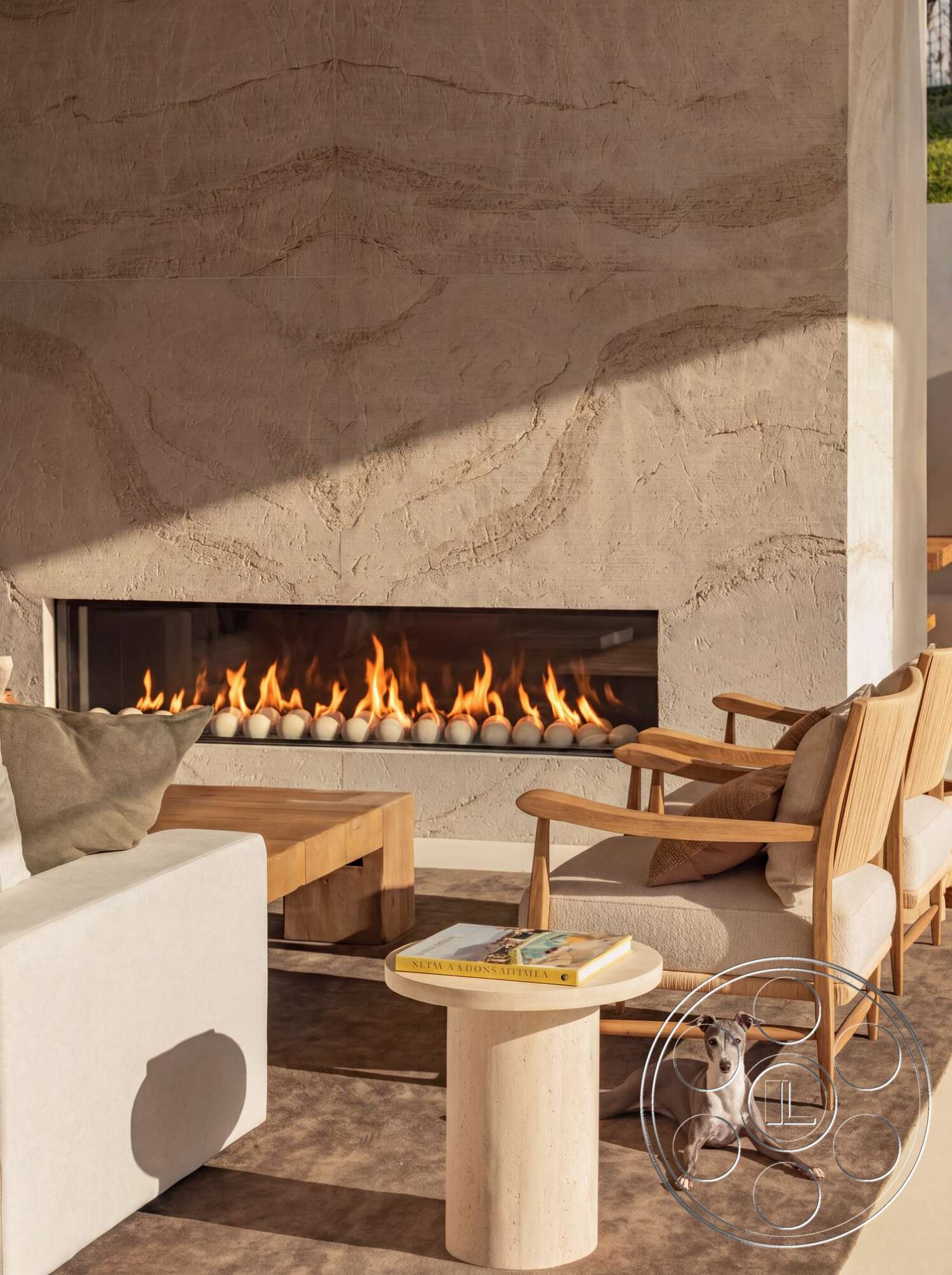 Modern 535 - minimalist decor, wood coffee table, open floor plan, soft area rug, linear gas fireplace, natural light flooded space, large glass window, textured plaster feature wall, modern wooden armchairs, textile sofa with neutral upholstery, circular stone side table
