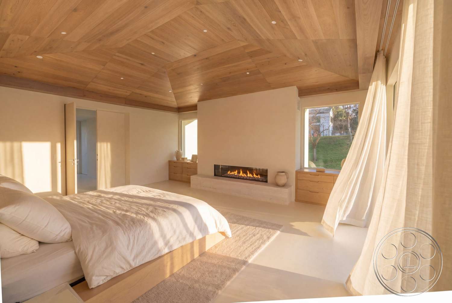 Modern 535 - natural lighting, textured area rug, wooden dresser, wood panel ceiling, floor-to-ceiling windows, plaster walls, exposed wood ceiling beams, modern fireplace surround, sheer window curtains, minimalist bedroom