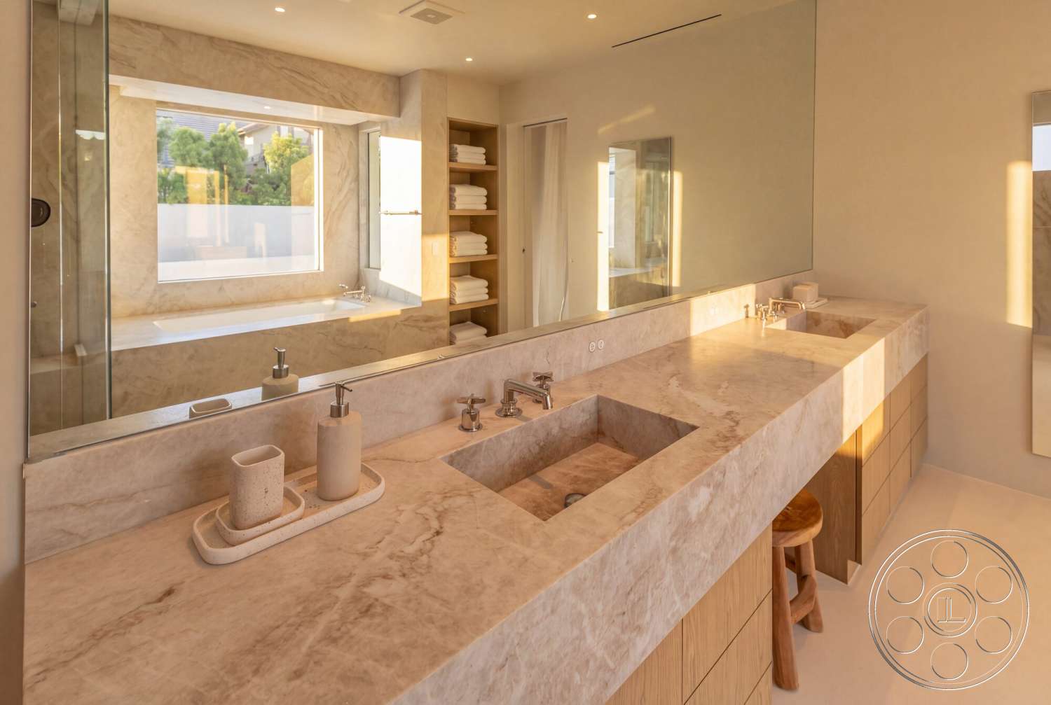 Modern 535 - neutral color palette, glass shower enclosure, textured plaster walls, natural light from windows, floor-to-ceiling mirror, modern faucet fixtures, marble bathroom countertops, open shelving for towels, wood bathroom cabinetry, soaking tub with marble surround