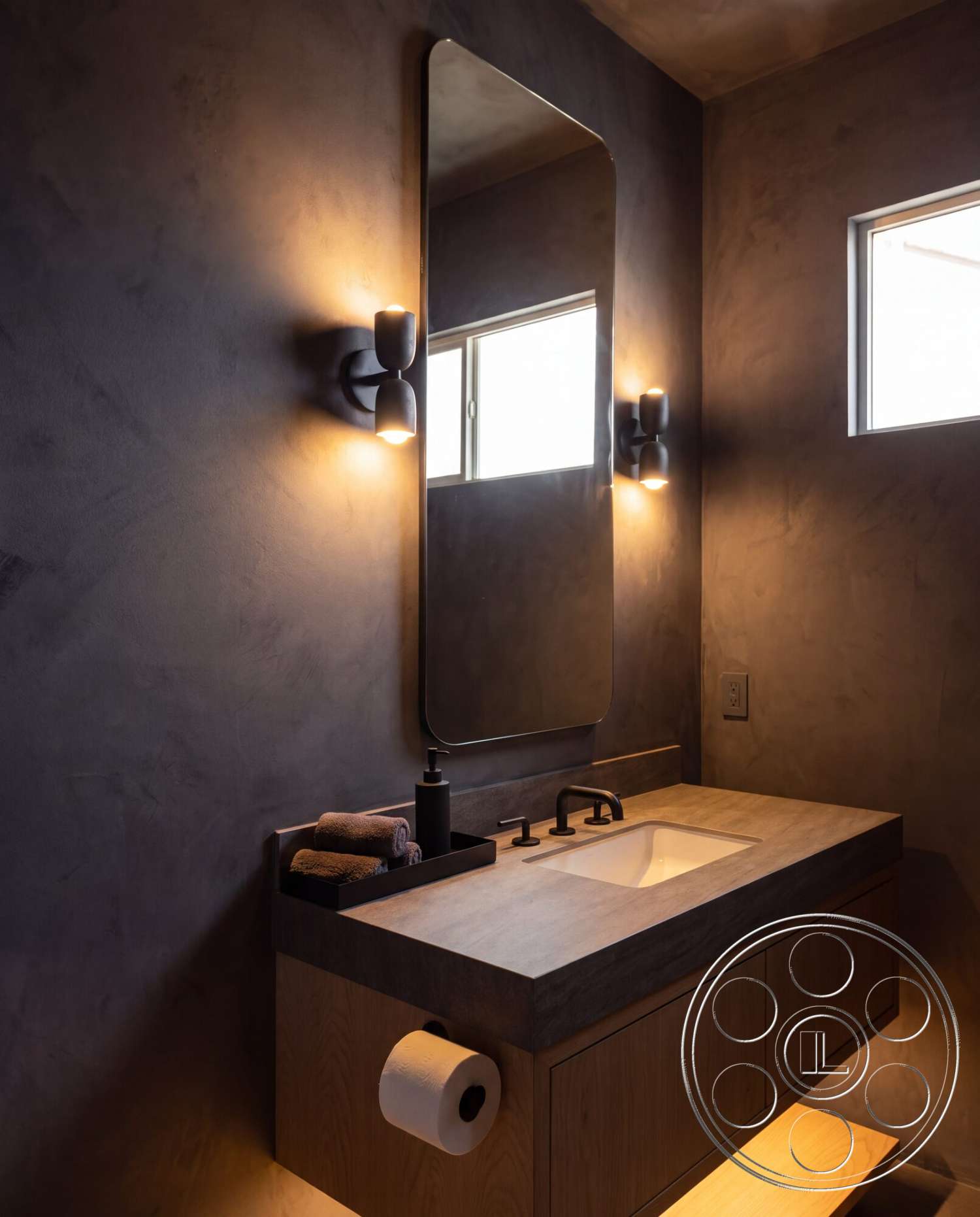 Modern 535 - minimalist design, open shelving, concrete countertop, framed mirror, wall-mounted faucet, modern bathroom lighting, textured plaster bathroom walls, black wall sconces, wood bathroom vanity, roll toilet paper holder