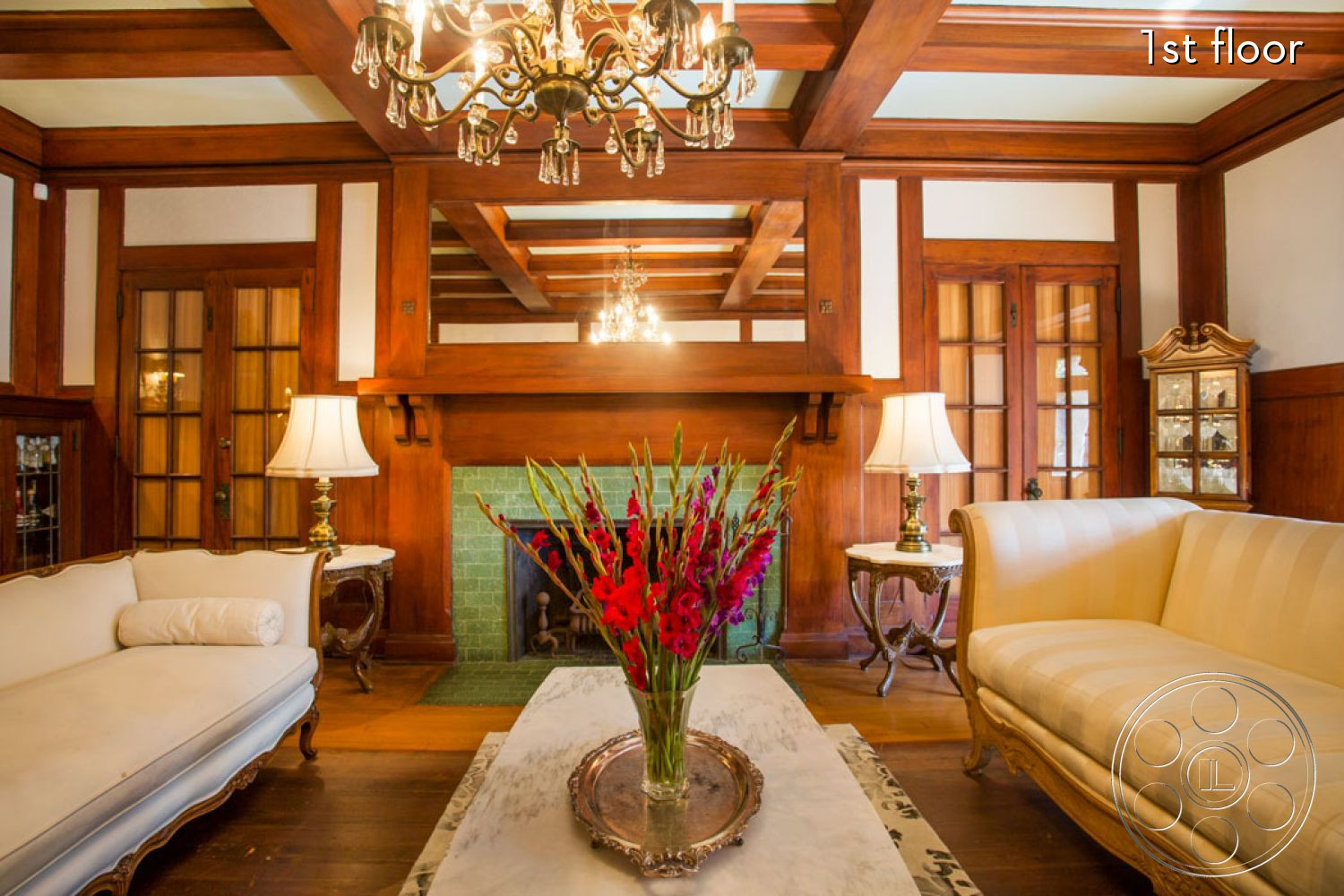 The Rosenheim Mansion - indoors, furniture, room, wood, lamp, living room, hardwood, couch, art, vase, jar, pottery, flower, table lamp, flower arrangement, blossom, ikebana, ornament