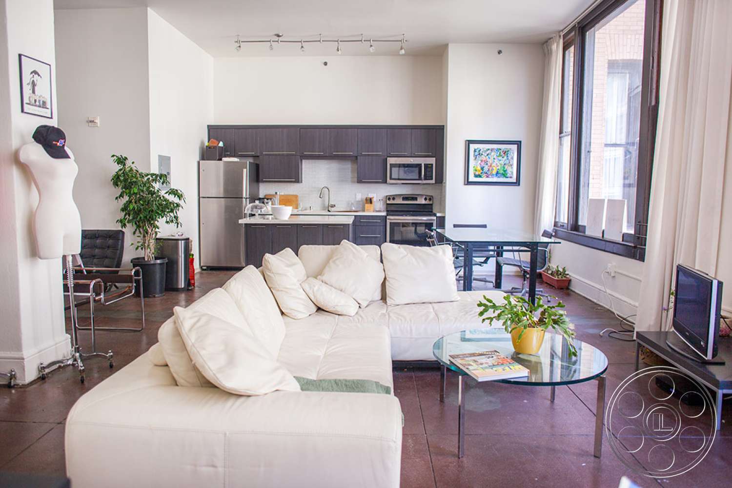 Loft 70 - indoors, furniture, table, room, living room, couch, coffee table, appliance, monitor, display, cushion, refrigerator, microwave, oven
