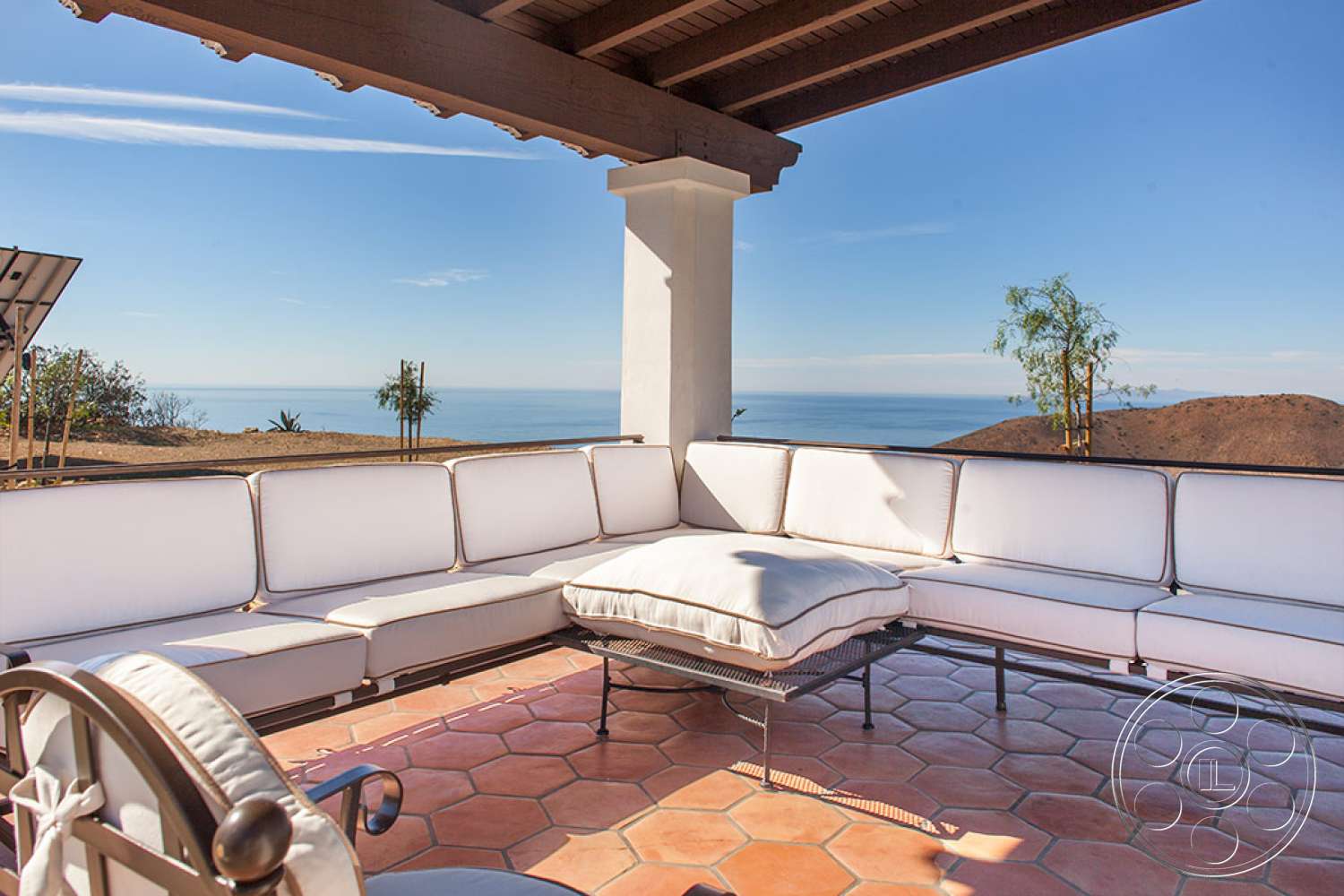 Spanish 36 - indoors, furniture, room, table, couch, coffee table, patio, rug, pillow, cushion