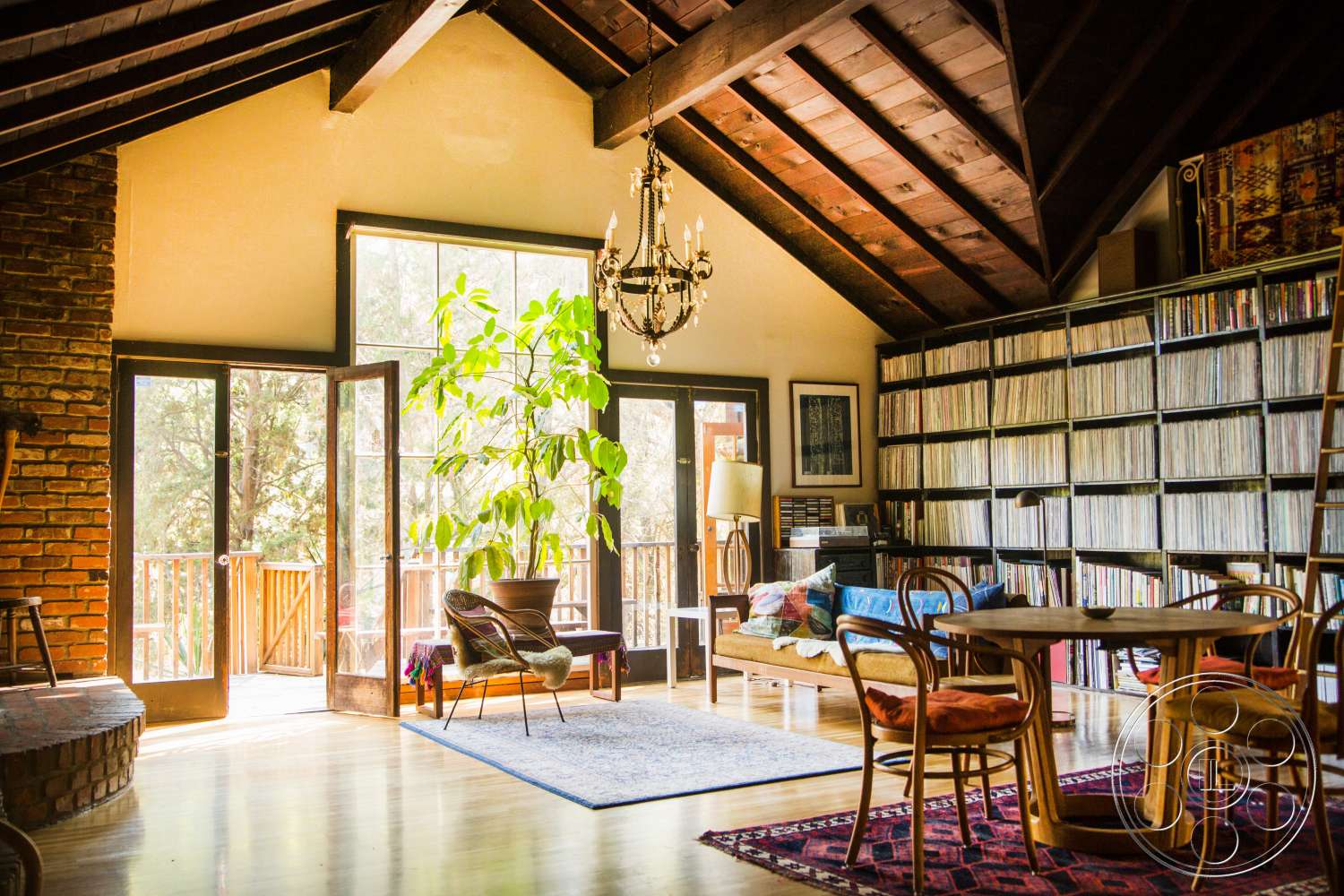 Bohemian 2 - indoors, furniture, room, chair, table, wood, lobby, living room, hardwood, couch, bookcase, records