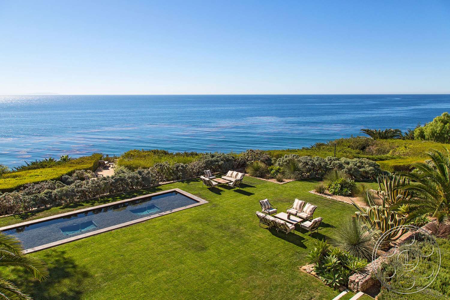 Mansion 16 - outdoors, water, vegetation, pool, swimming pool, house, villa, land, bush, grass, ocean, sea, shoreline, coast